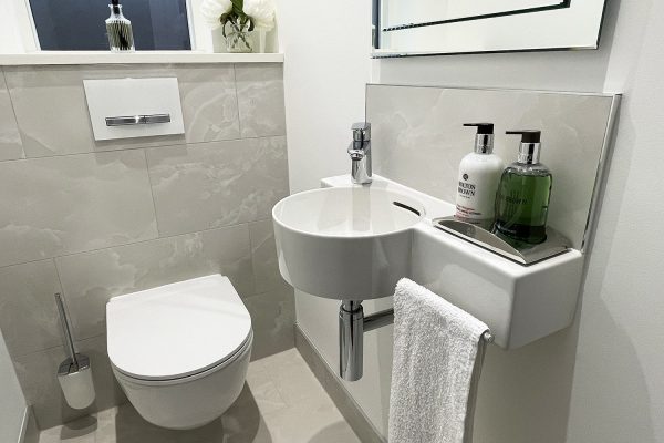 3. Laufen Pro rimless wall hung WC with Geberit concealed frame and cistern.